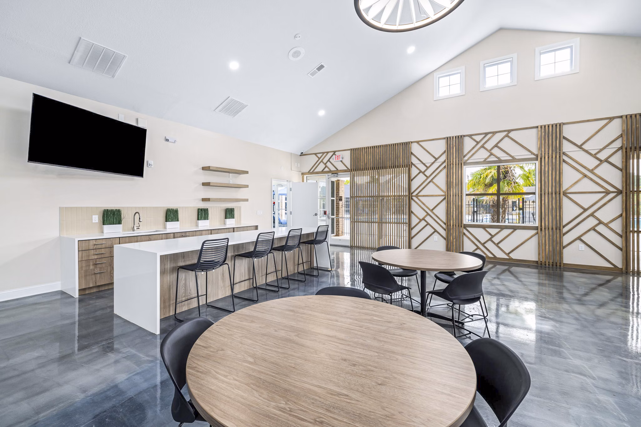 Modern clubhouse with stylish seating areas at 403 West Apartments, offering luxury amenities and community spaces in a premium location