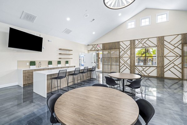Modern clubhouse with stylish seating areas at 403 West Apartments, offering luxury amenities and community spaces in a premium location