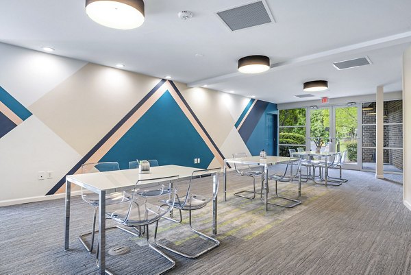 Clubhouse featuring elegant design and comfortable seating at 403 West Apartments