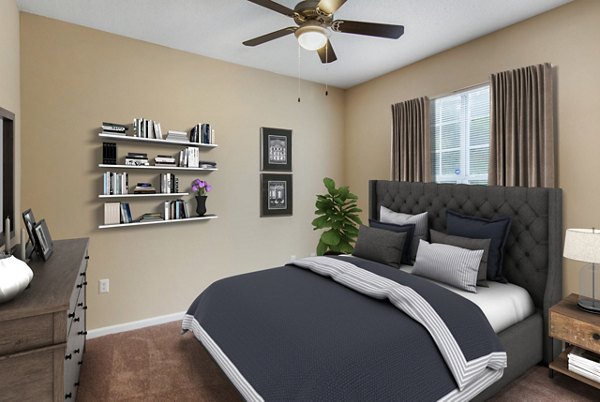 Bedroom featuring modern decor and natural light at Mainstreet at Conyers Apartments