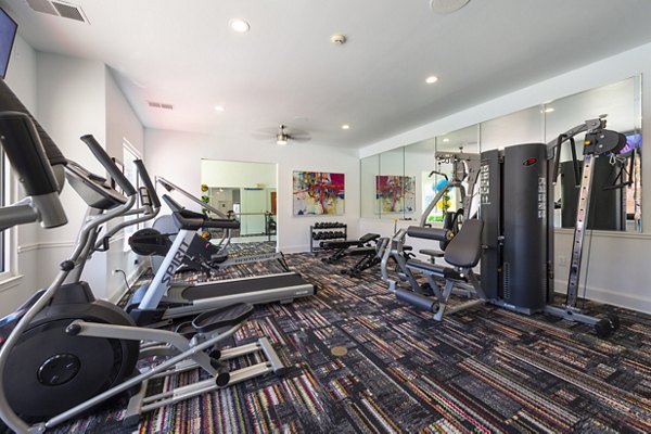 State-of-the-art fitness center at Mainstreet at Conyers Apartments featuring modern exercise equipment and spacious workout areas