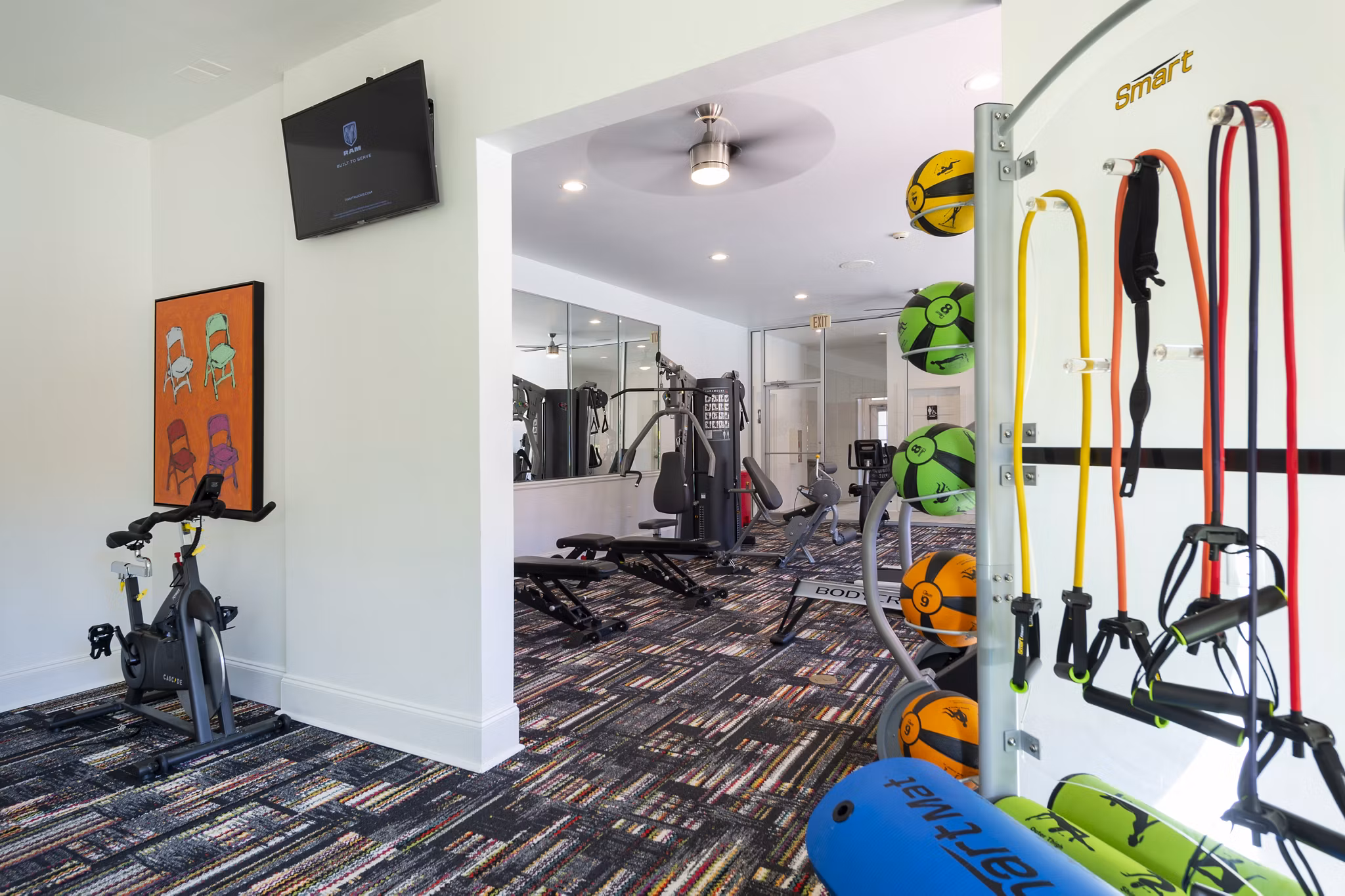 State-of-the-art fitness center at Mainstreet at Conyers Apartments with modern equipment and spacious workout areas