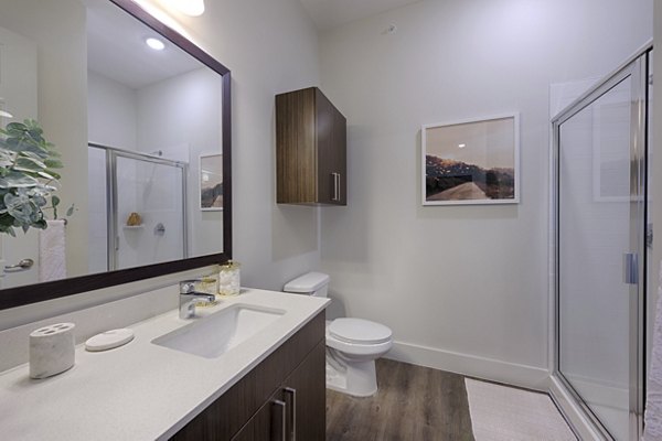 Elegant bathroom with modern fixtures at Millennium Music Row Apartments in Nashville