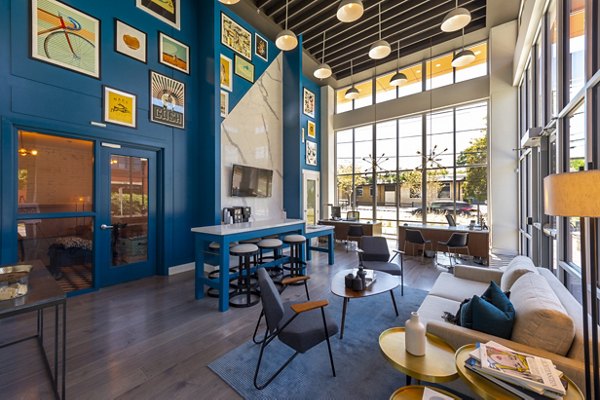 Clubhouse with modern design and seating at Millennium Music Row Apartments