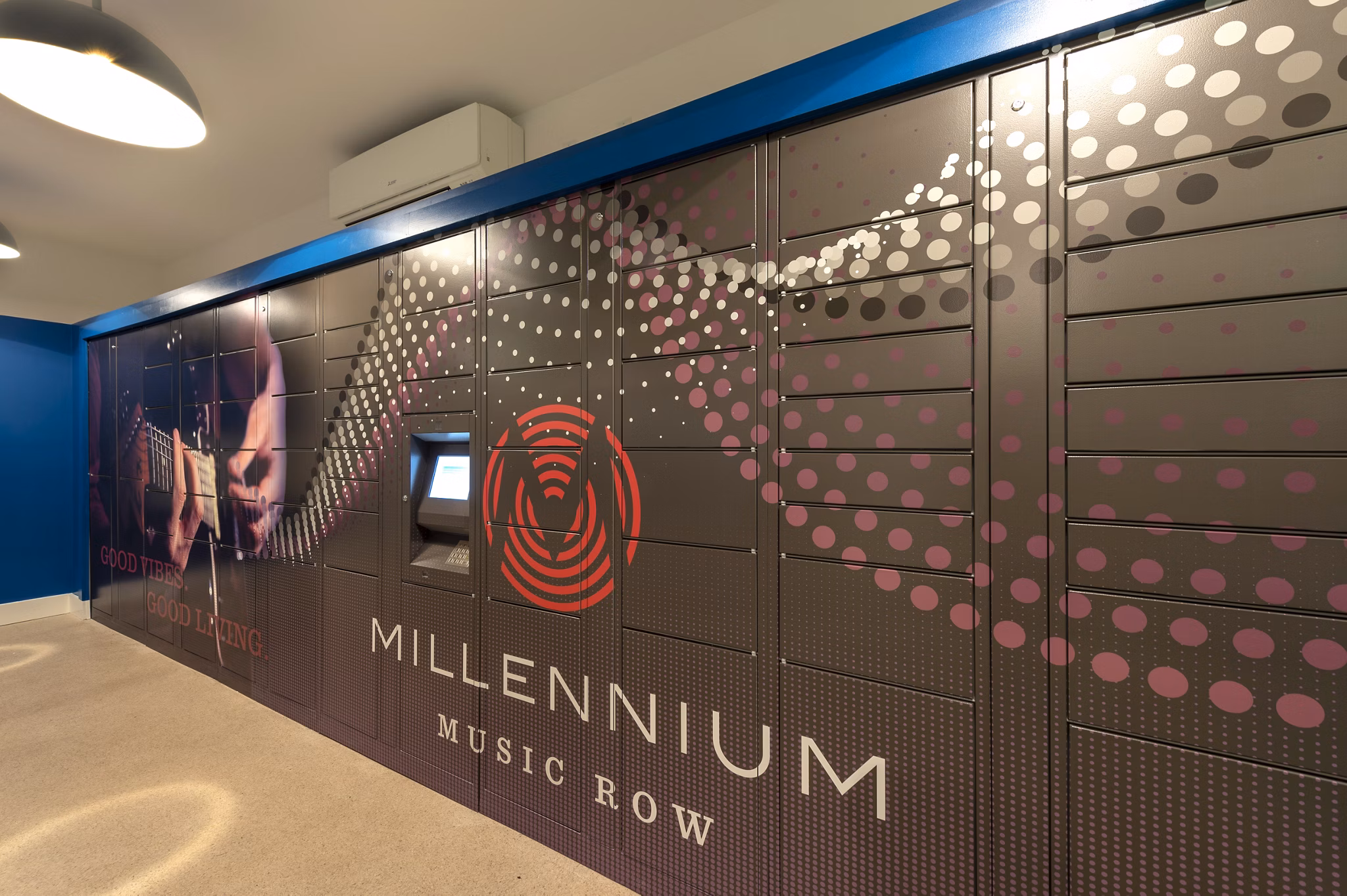 Modern mail room with secure package lockers at Millennium Music Row Apartments