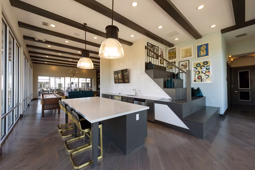 Clubhouse with elegant seating and modern design at Millennium Music Row Apartments