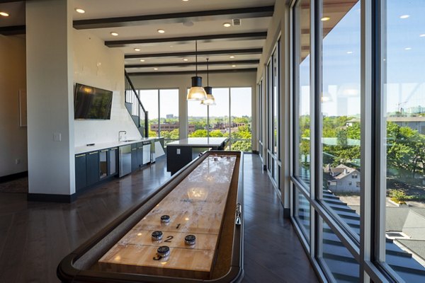 Clubhouse featuring modern design elements at Millennium Music Row Apartments in Nashville