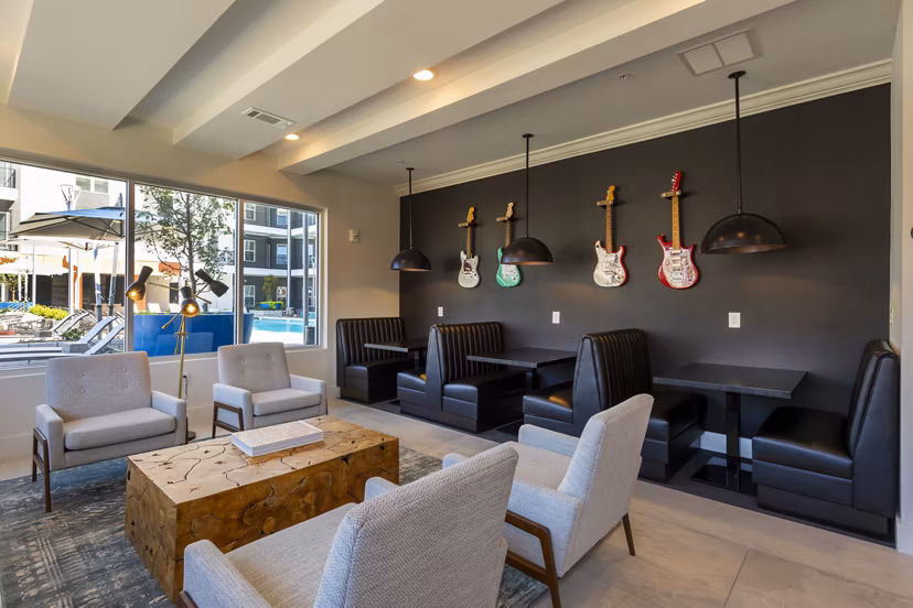 Clubhouse with modern decor and stylish seating at Millennium Music Row Apartments in Nashville