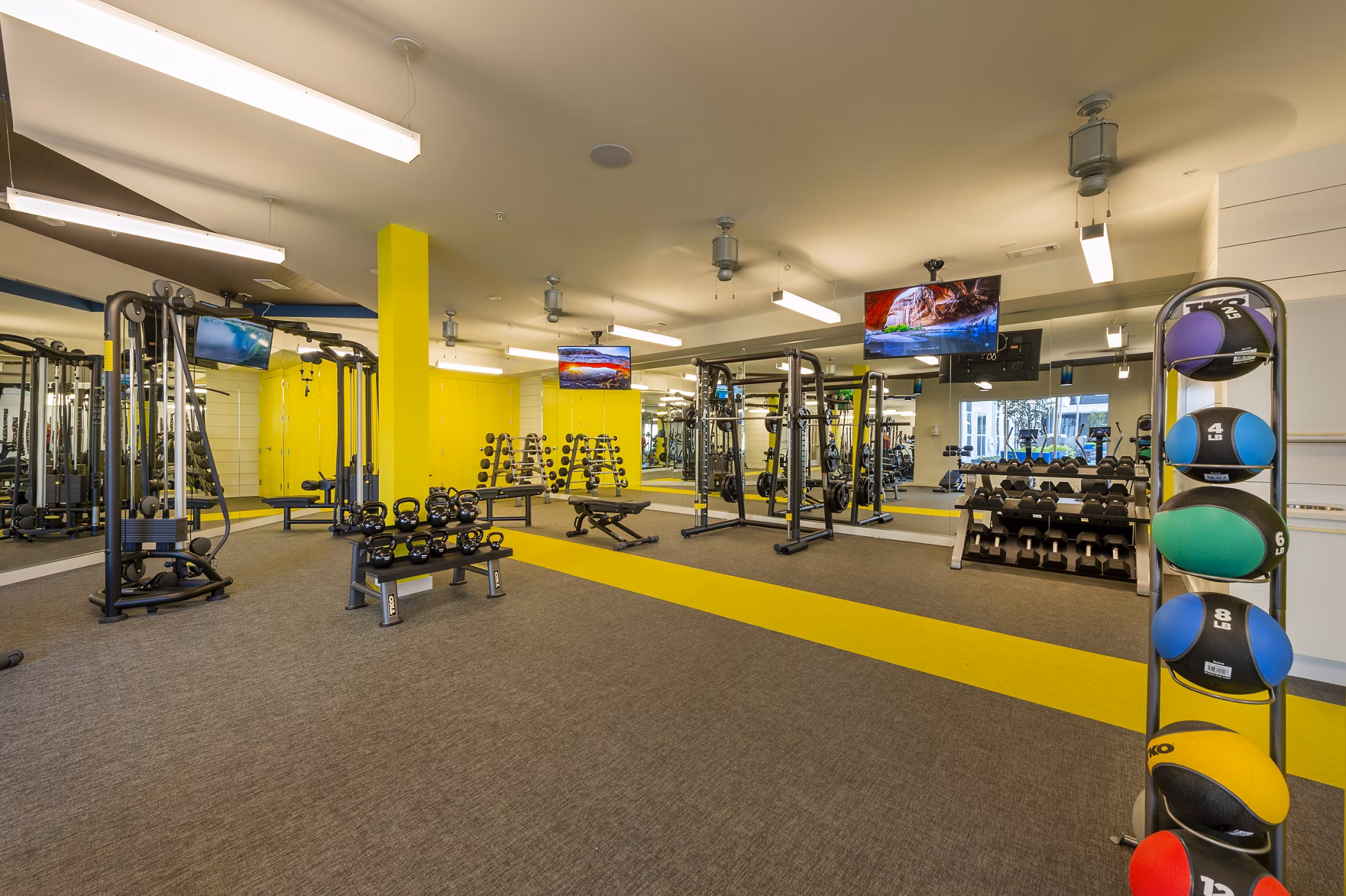 State-of-the-art fitness center with modern equipment at Millennium Music Row Apartments