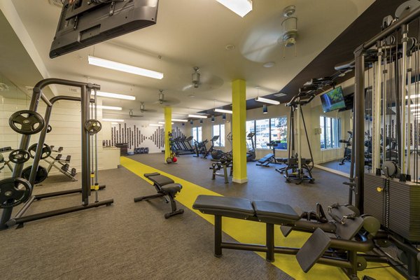 State-of-the-art fitness center with modern equipment at Millennium Music Row Apartments