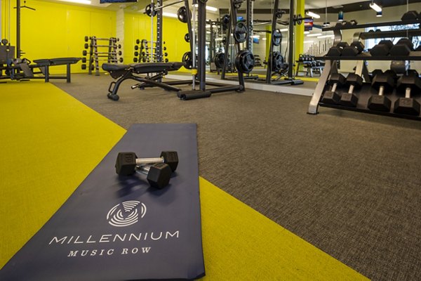State-of-the-art fitness center featuring modern equipment at Millennium Music Row Apartments