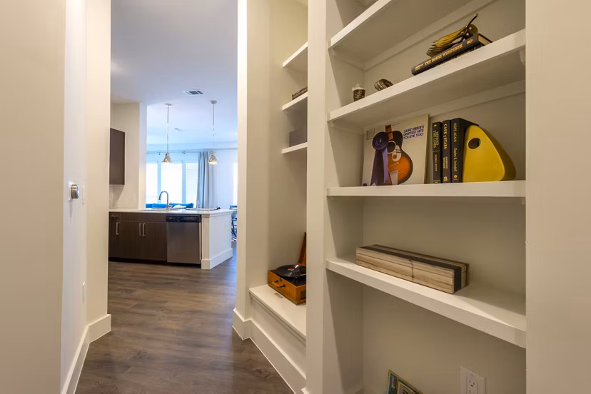 Elegant hallway with modern lighting at Millennium Music Row Apartments