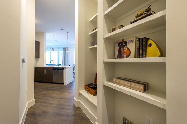 Elegant hallway with modern lighting at Millennium Music Row Apartments