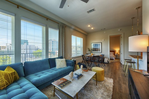 Spacious living room with modern decor at Millennium Music Row Apartments