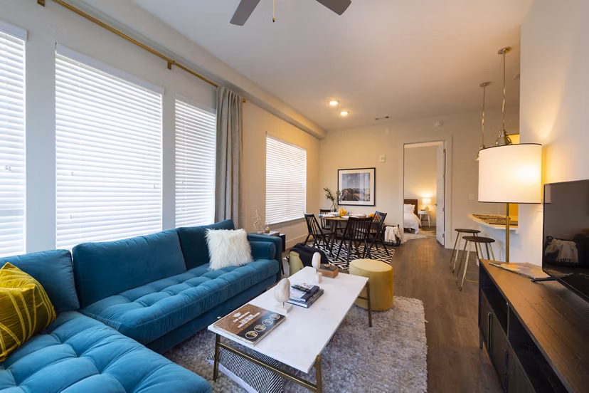 Spacious living room with modern decor in Millennium Music Row Apartments
