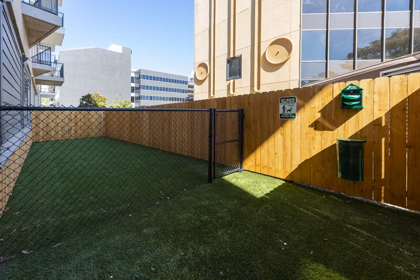 Spacious dog park at Millennium Music Row Apartments offering pet-friendly amenities and community space