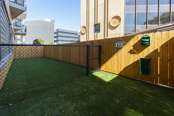 Spacious dog park at Millennium Music Row Apartments offering pet-friendly amenities and community space