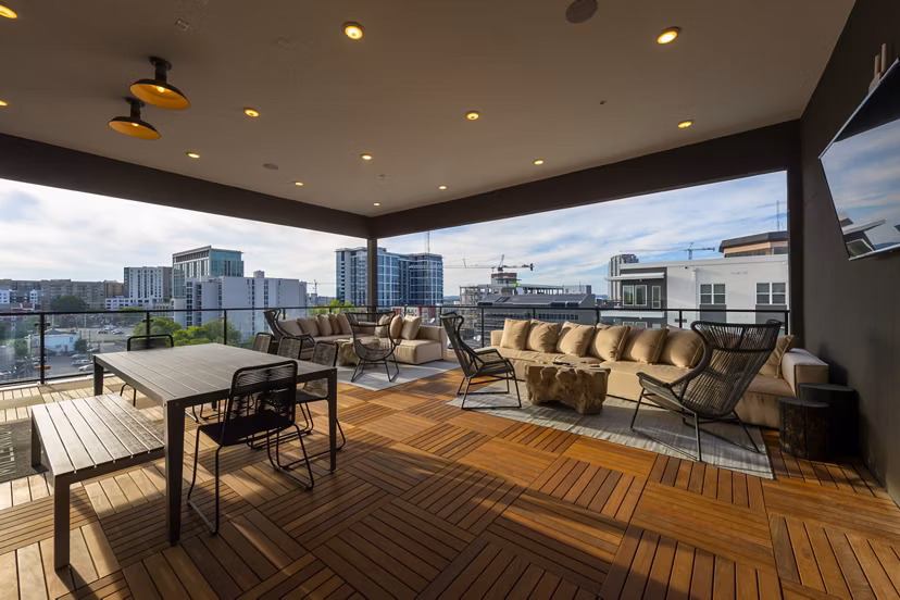 Patio with stylish seating at Millennium Music Row Apartments, perfect for outdoor relaxation and entertainment