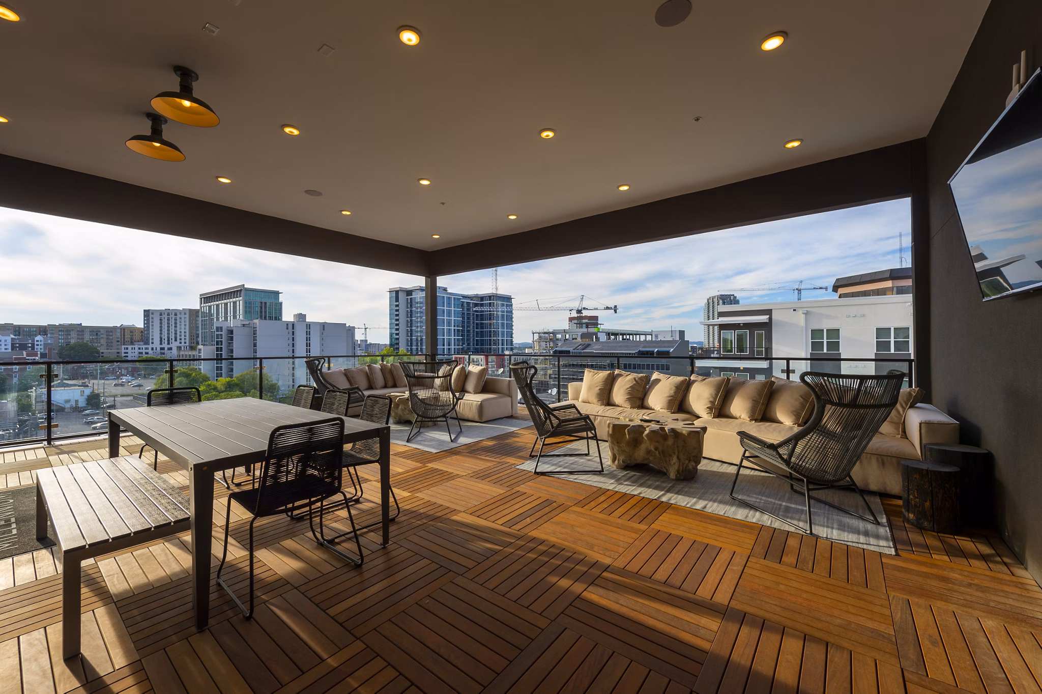 Patio with stylish seating at Millennium Music Row Apartments, perfect for outdoor relaxation and entertainment