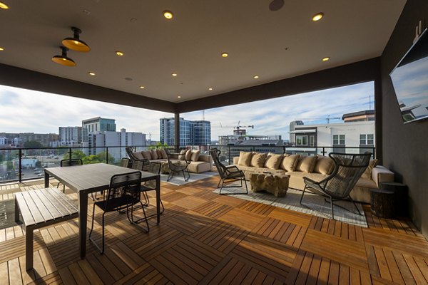 Patio with stylish seating at Millennium Music Row Apartments, perfect for outdoor relaxation and entertainment