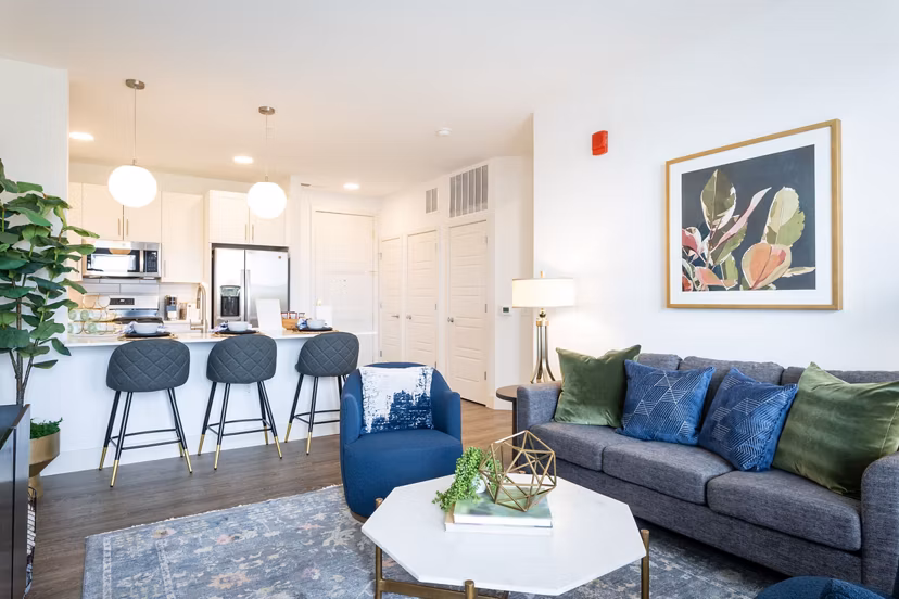 Spacious living room with modern decor in Everleigh Vernon Hills Apartments