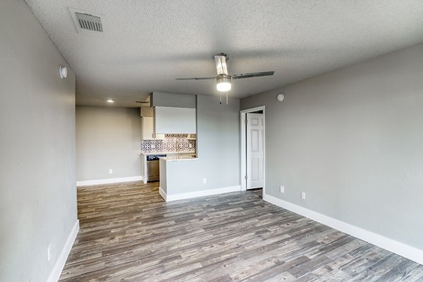 Cozy living room with modern decor and large windows at Avana Cordoba Apartments