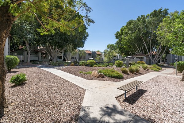 Tranquil courtyard with lush landscaping at Avana Cordoba Apartments, a Greystar luxury community