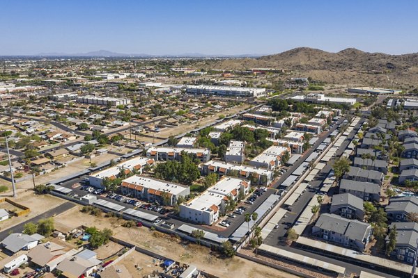 Garden view at Avana Cordoba Apartments: Lush greenery and modern design in a tranquil setting