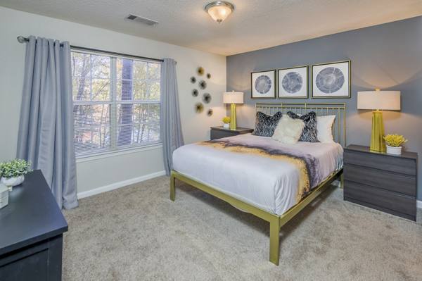 bedroom at The Oxford Apartments