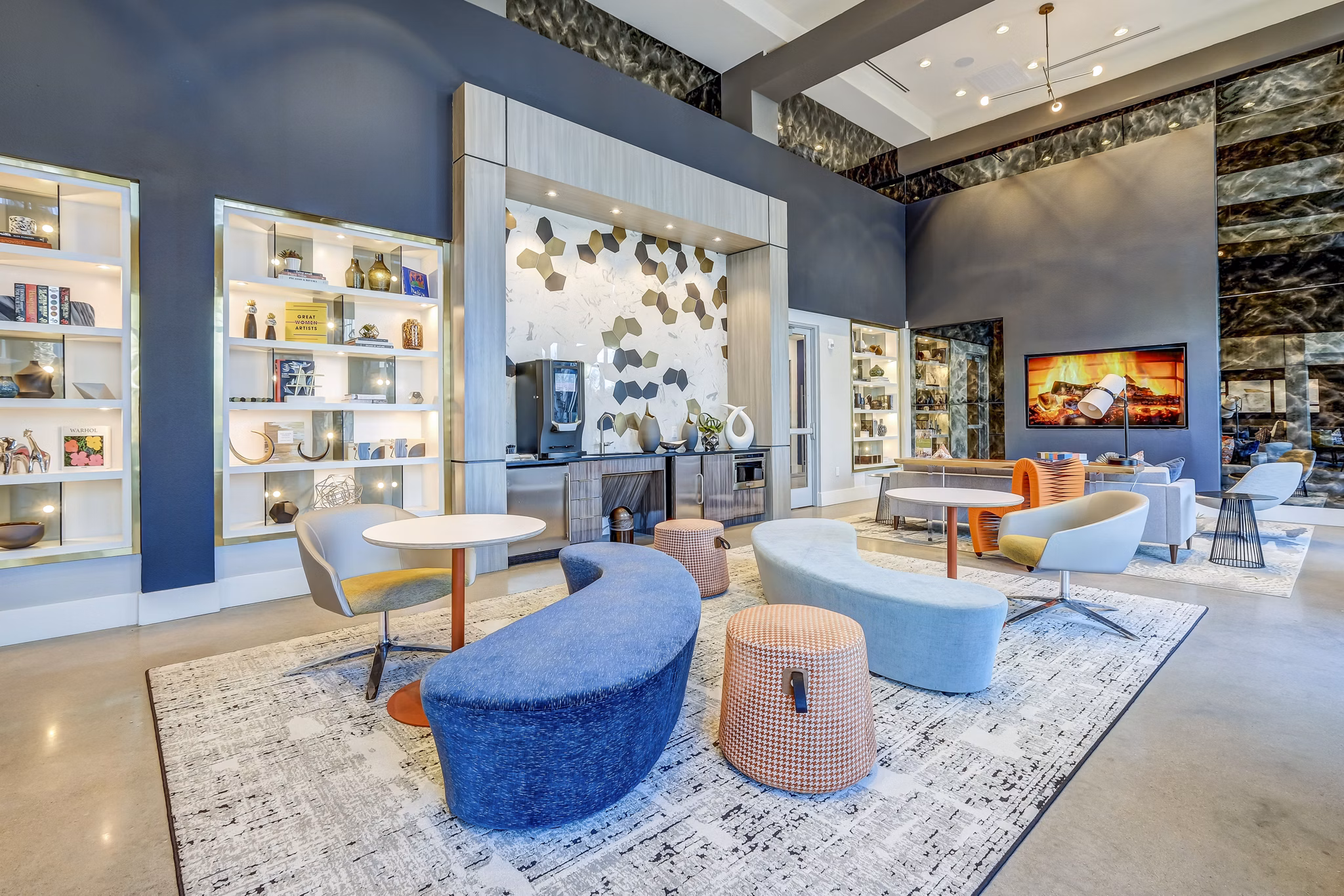 Modern clubhouse with stylish seating and billiards at Encore Motif Apartments, offering a luxury living experience for residents