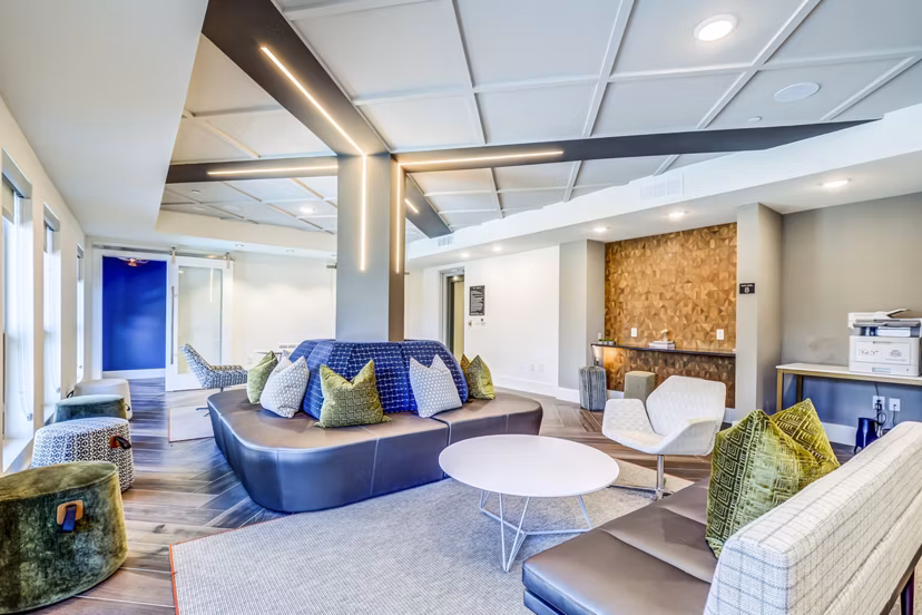 Stylish clubhouse with modern decor at Encore Motif luxury apartments, ideal for social gatherings and events