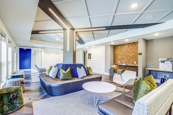 Stylish clubhouse with modern decor at Encore Motif luxury apartments, ideal for social gatherings and events