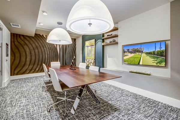 Clubhouse meeting facility with modern decor at Encore Motif Apartments providing a stylish space for gatherings and events