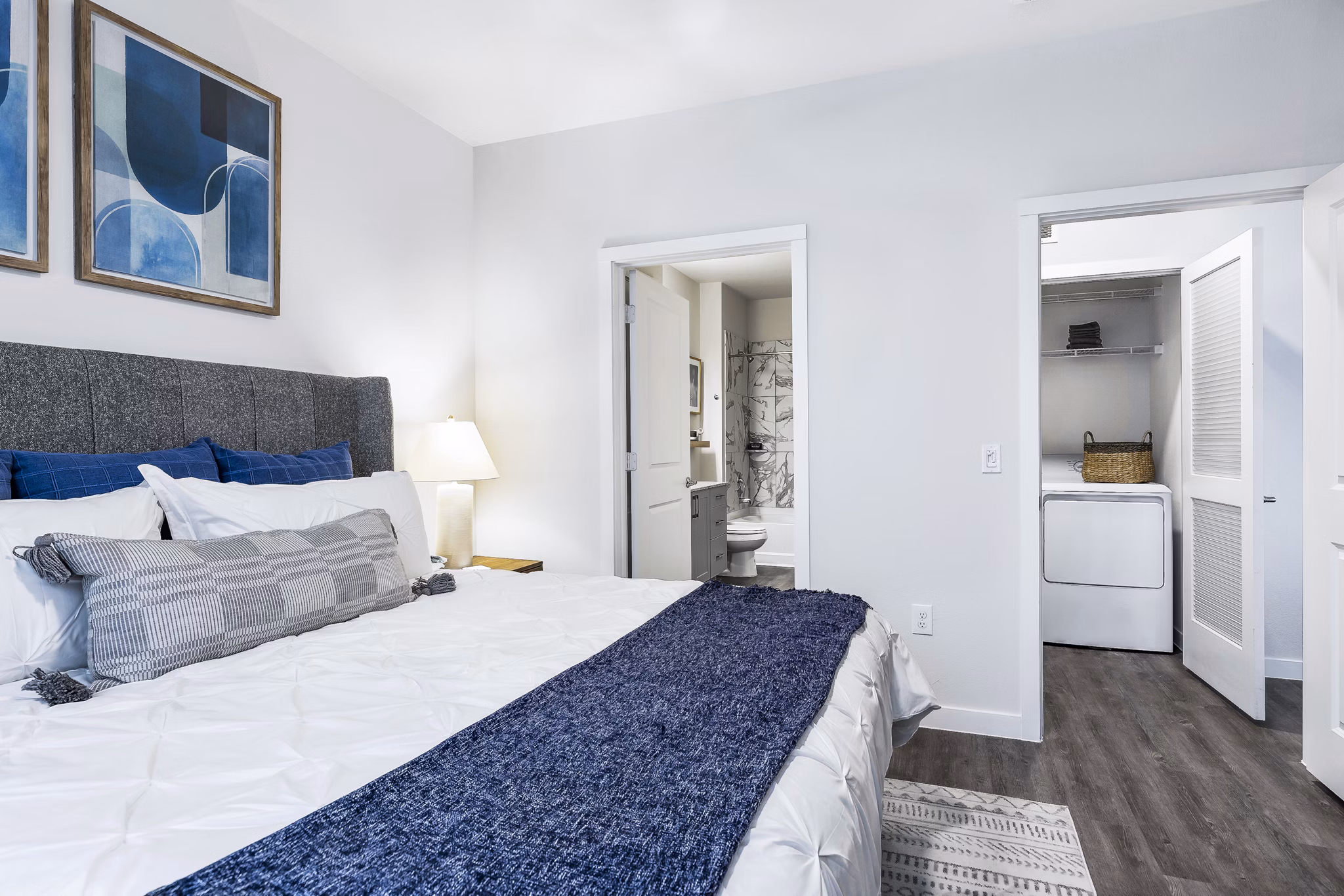 Elegant bedroom with modern furnishings at Prose Manor Apartments