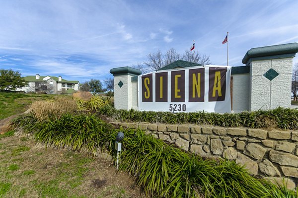 Siena Apartments: Modern signage showcasing brand identity in vibrant community setting