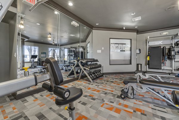 Fitness center with state-of-the-art equipment at Siena Apartments, providing luxury workout options for residents