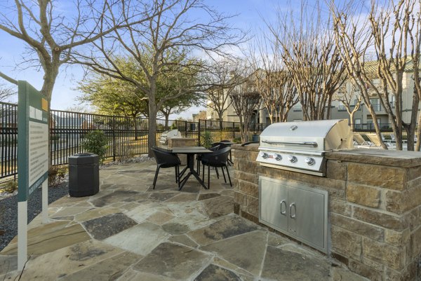 Outdoor grill area perfect for casual gatherings at Siena Apartments