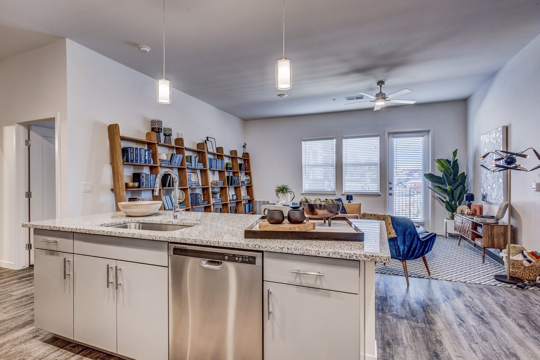 Modern kitchen with stainless steel appliances in Polaris Junction Apartments