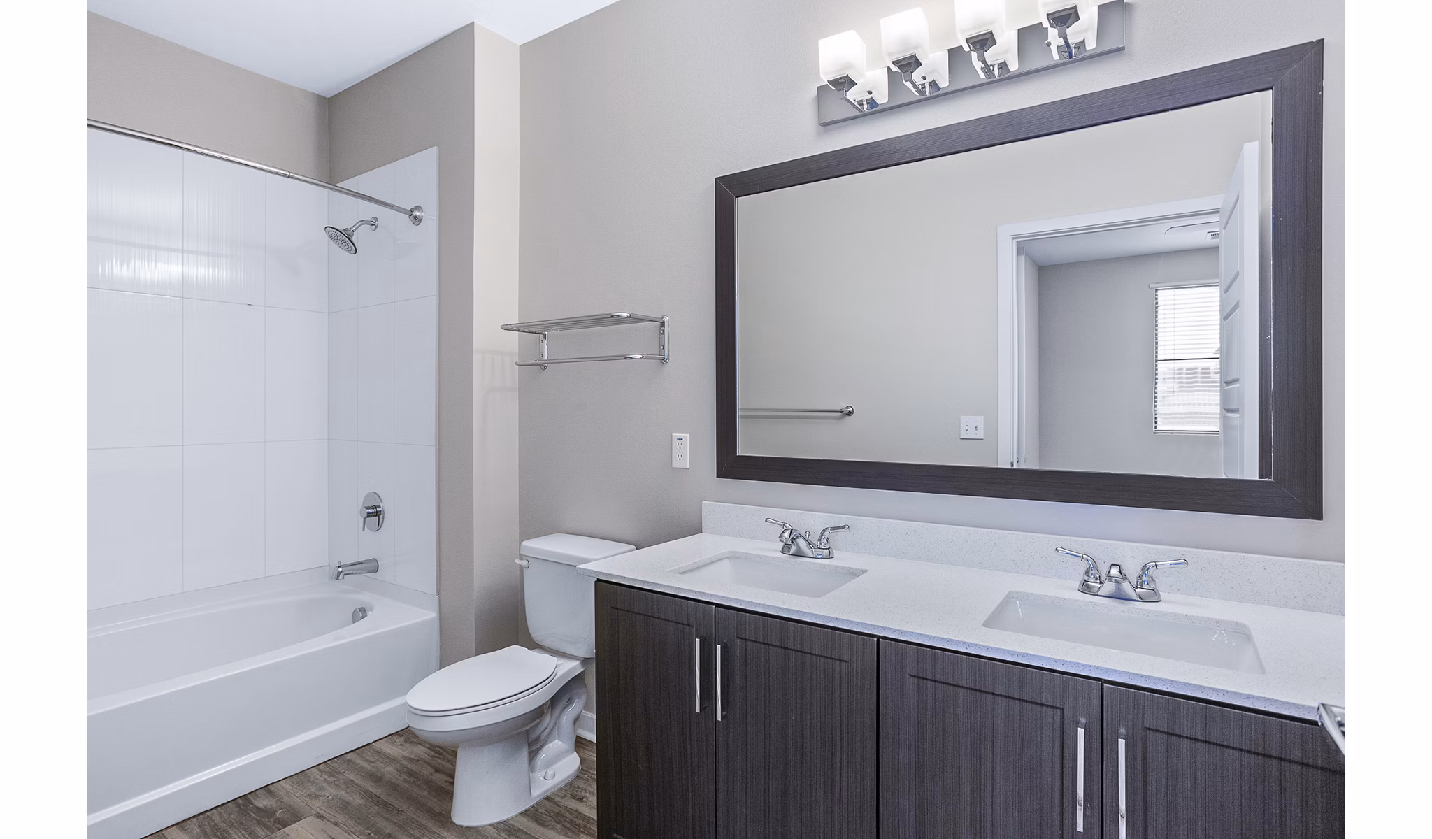 Bathroom with modern fixtures and elegant design at 601 PAX Apartments, a Greystar luxury property