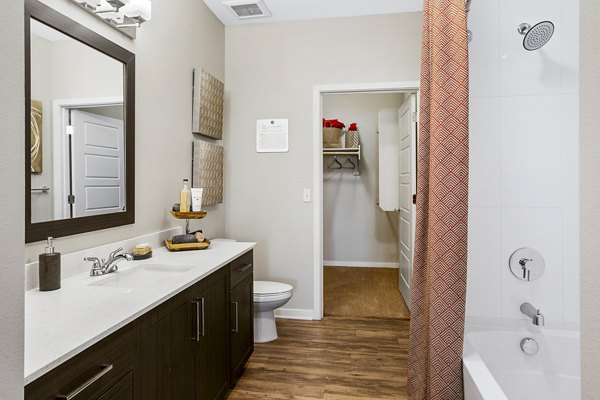 Bathroom featuring modern fixtures at 601 PAX Apartments, a luxury property managed by Greystar