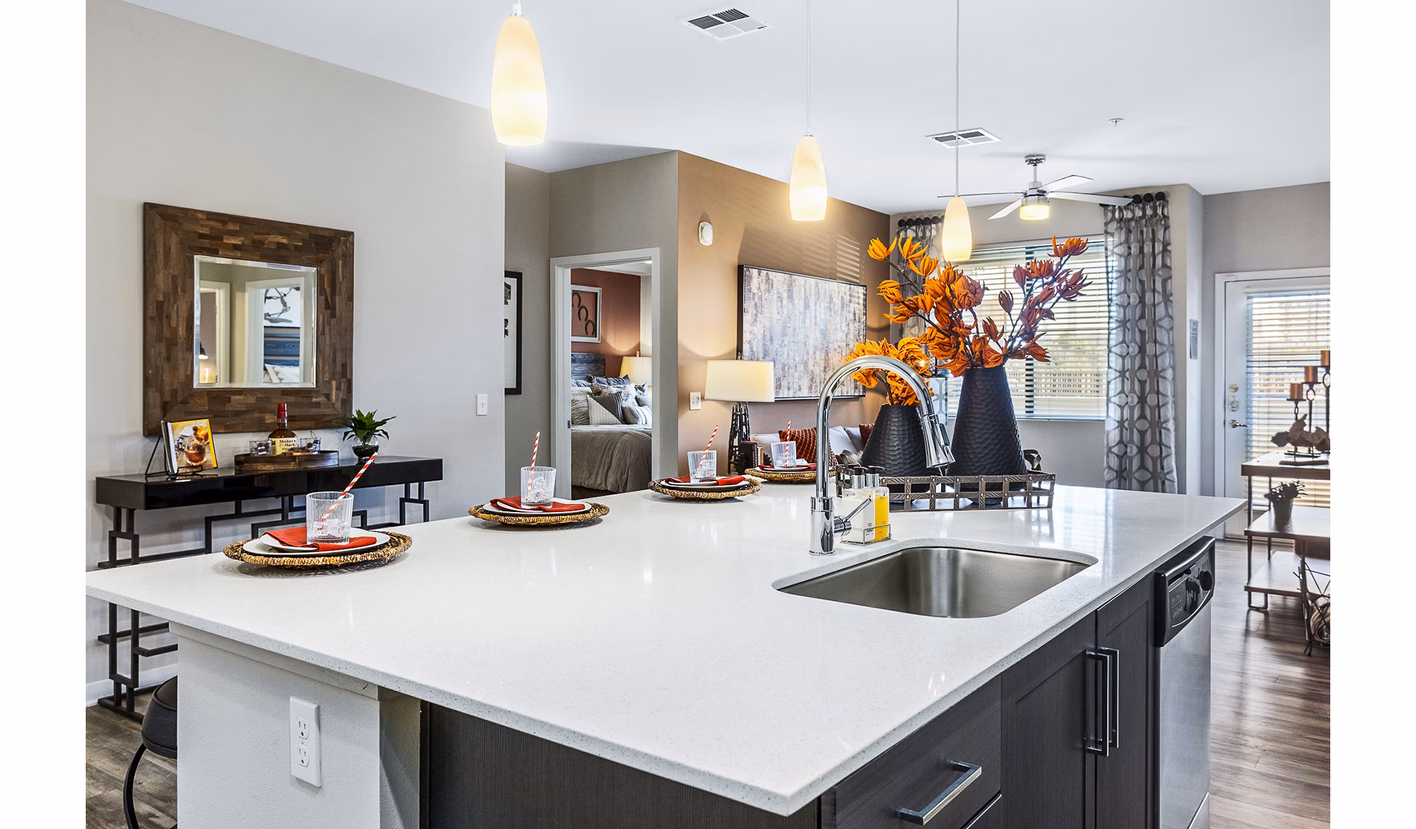 Modern kitchen with sleek countertops and stainless steel appliances at 601 PAX Apartments, showcasing luxury living in a stylish setting