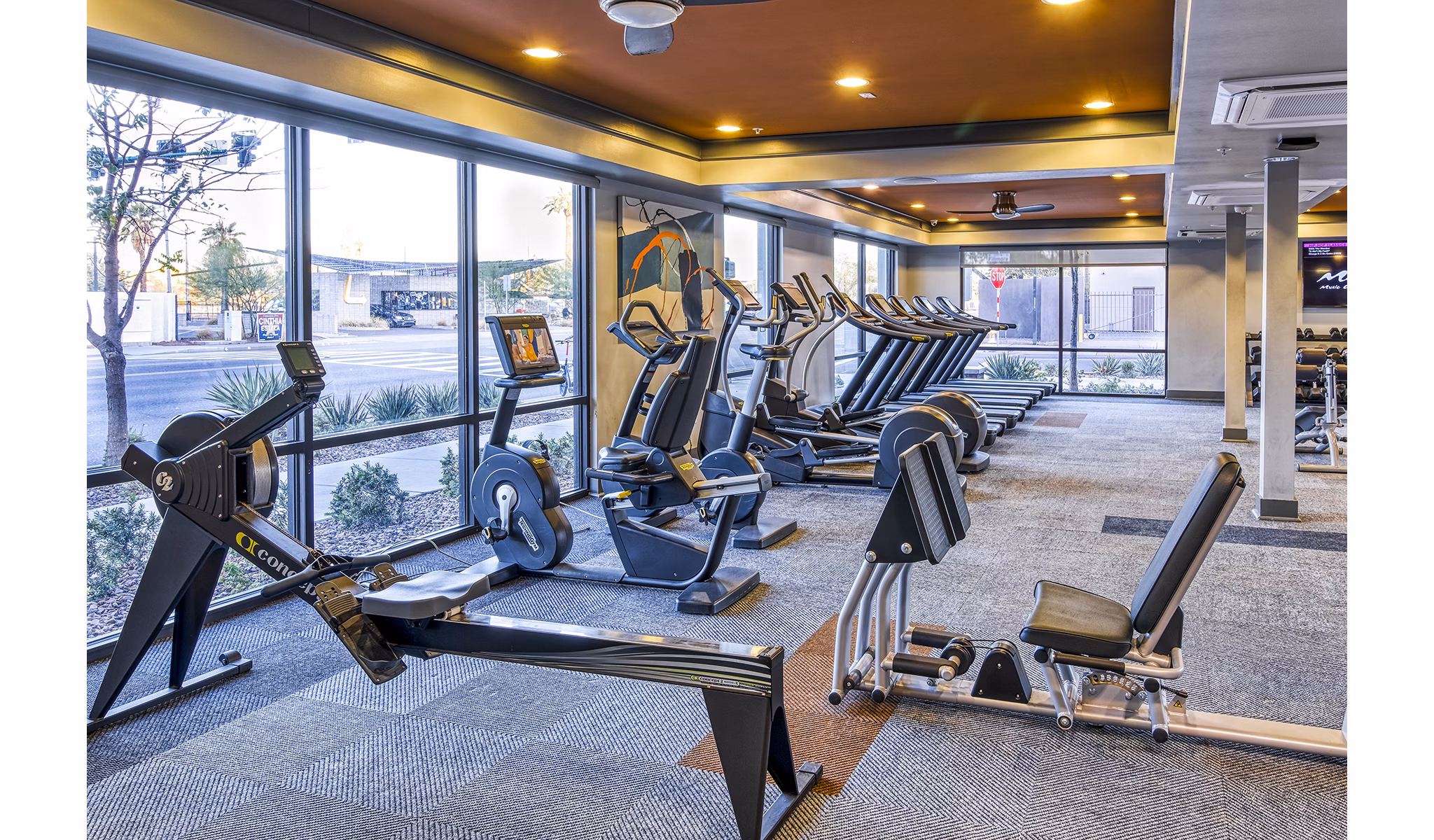 State-of-the-art fitness center at 601 PAX Apartments with modern equipment and spacious workout areas, ideal for luxury living