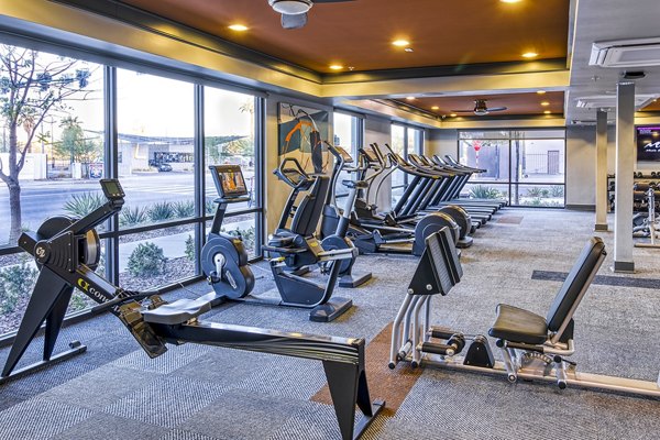 State-of-the-art fitness center at 601 PAX Apartments with modern equipment and spacious workout areas, ideal for luxury living