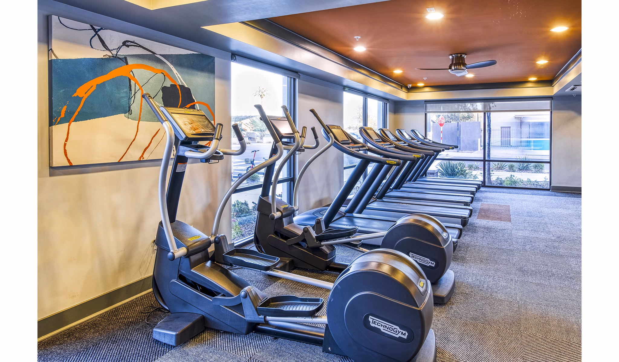 Fully-equipped fitness center with modern machines at 601 PAX Apartments