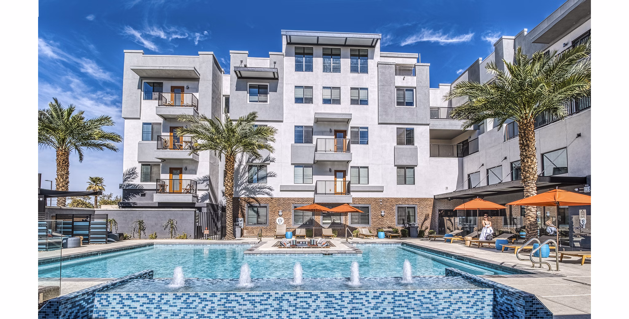 Rooftop pool with city skyline views at 601 PAX Apartments
