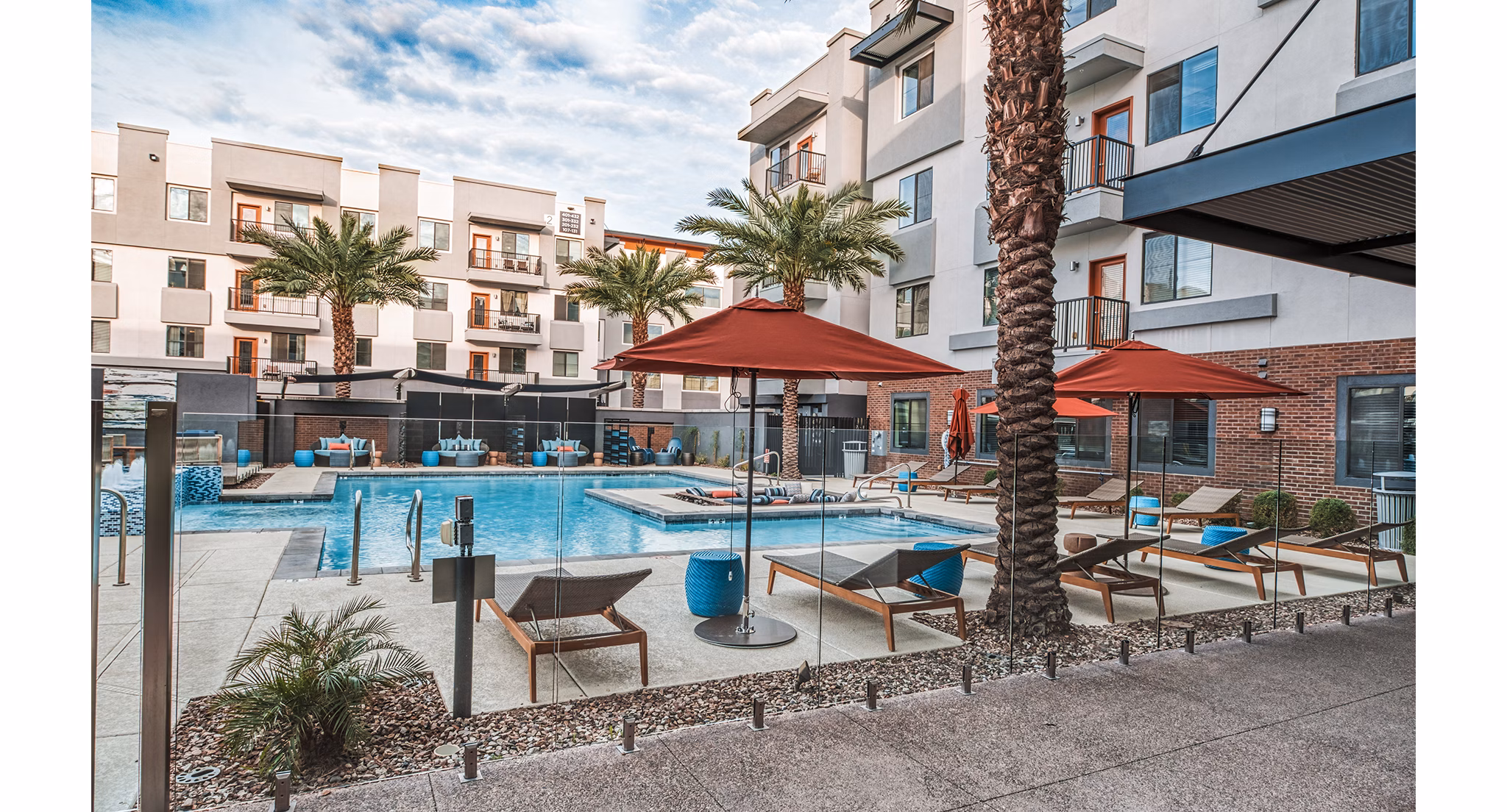Outdoor pool with city views at 601 PAX Apartments