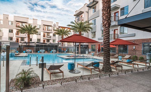 Outdoor pool with city views at 601 PAX Apartments