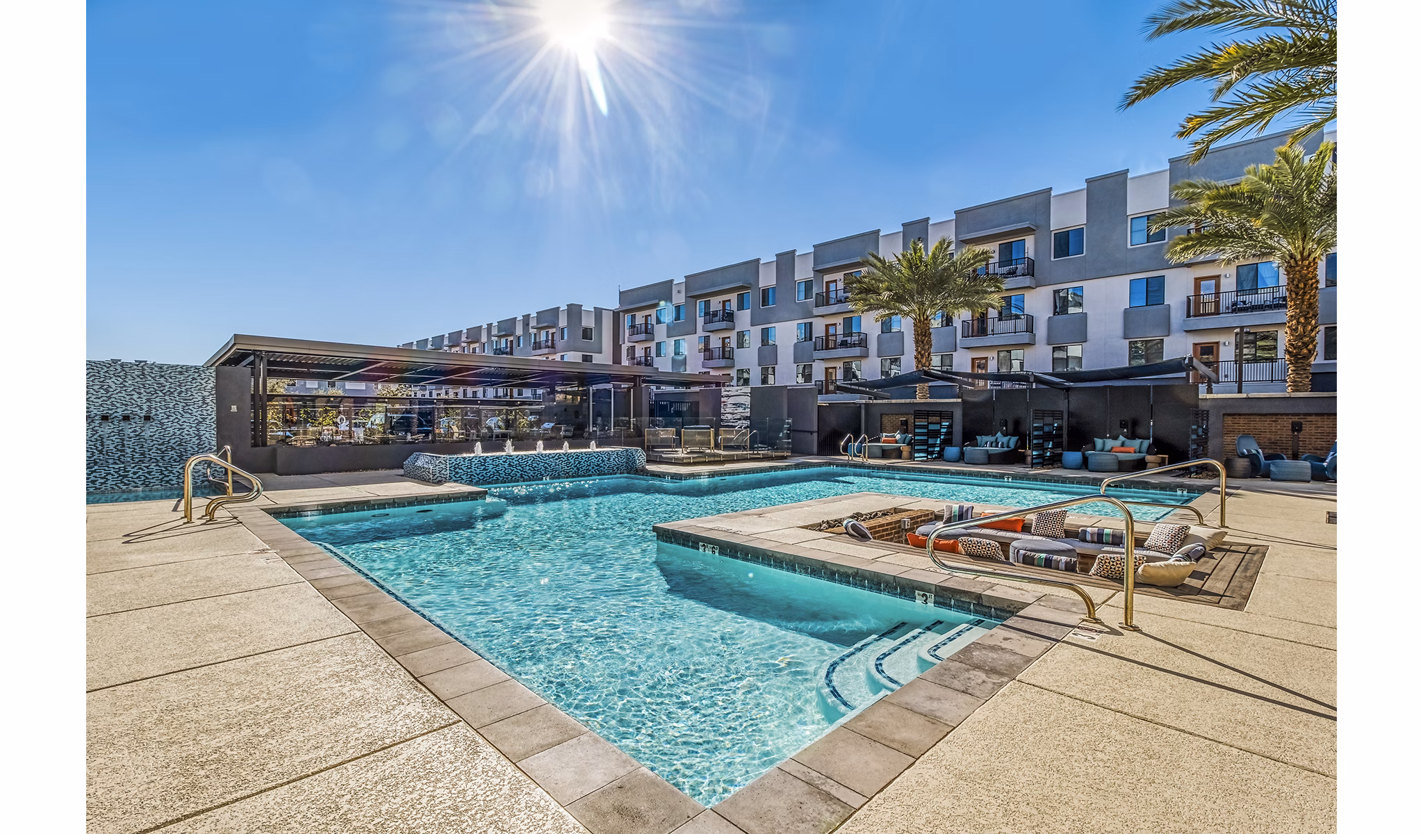 Luxurious rooftop pool at 601 PAX Apartments with scenic views, perfect for relaxation and recreation
