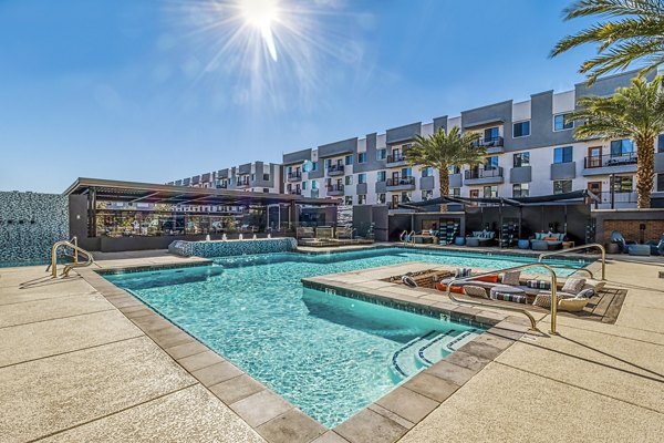 Luxurious rooftop pool at 601 PAX Apartments with scenic views, perfect for relaxation and recreation