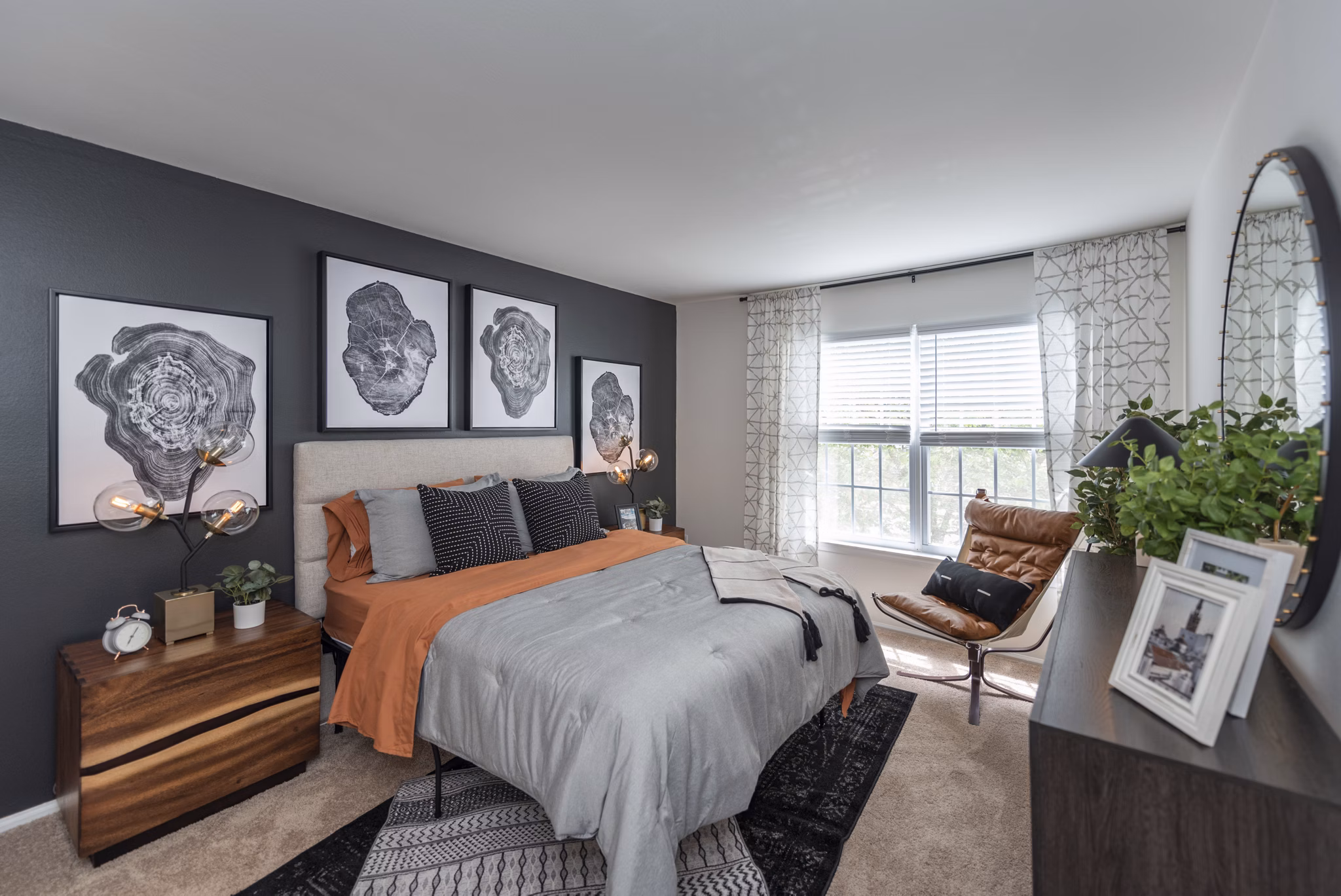 Elegant bedroom featuring modern decor and natural light at Avana Fieldstone Apartments